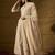 Cream faux georgette stitched gown with lace dupatta full sleeve embroidered