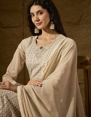Cream faux georgette stitched gown with lace dupatta full sleeve embroidered 4