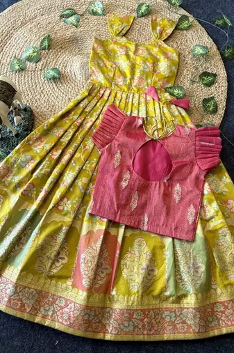 Festive wear yellow dola silk zari and thread weaving gown with pink koti