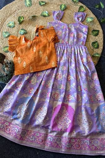 Festive wear lavender dola silk zari and thread weaving gown with orange koti