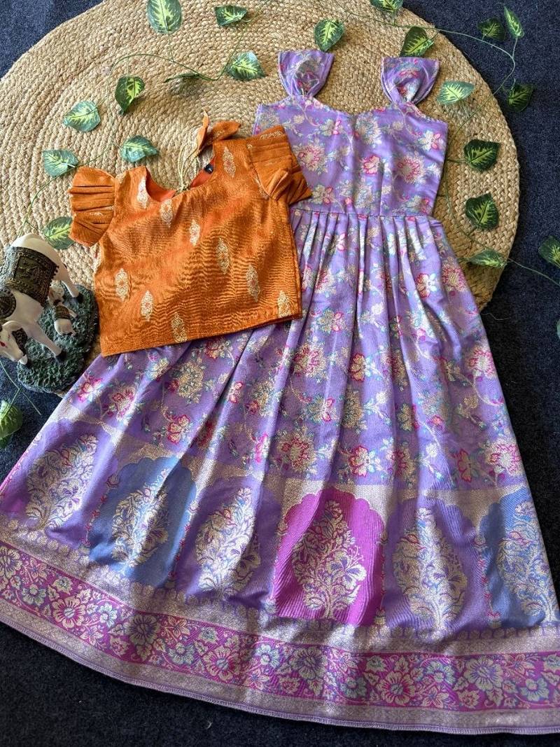 Festive wear lavender dola silk zari and thread weaving gown with orange koti