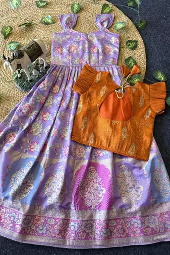 Festive wear lavender dola silk zari and thread weaving gown with orange koti