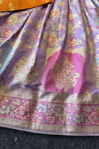 Festive wear lavender dola silk zari and thread weaving gown with orange koti