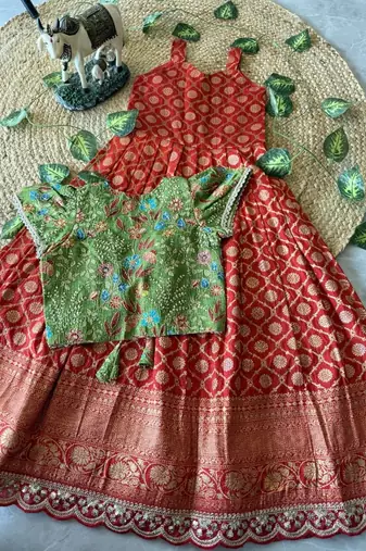 Festive wear dola silk zari and thread weaving gown with position print koti