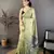 green printed cotton saree with unstitched blouse piece