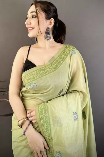 green printed cotton saree with unstitched blouse piece