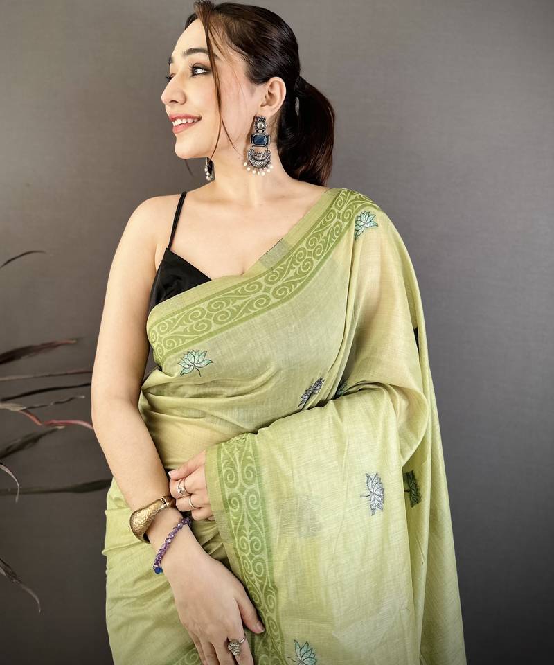 green printed cotton saree with unstitched blouse piece
