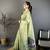 green printed cotton saree with unstitched blouse piece