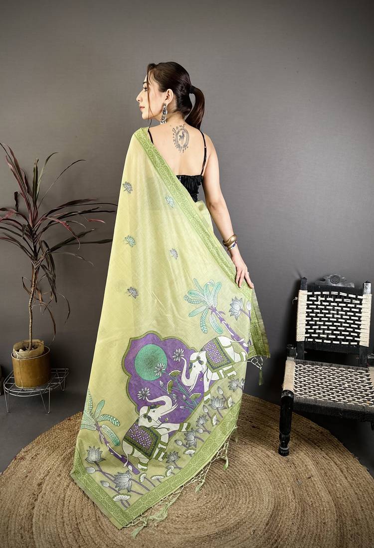 green printed cotton saree with unstitched blouse piece