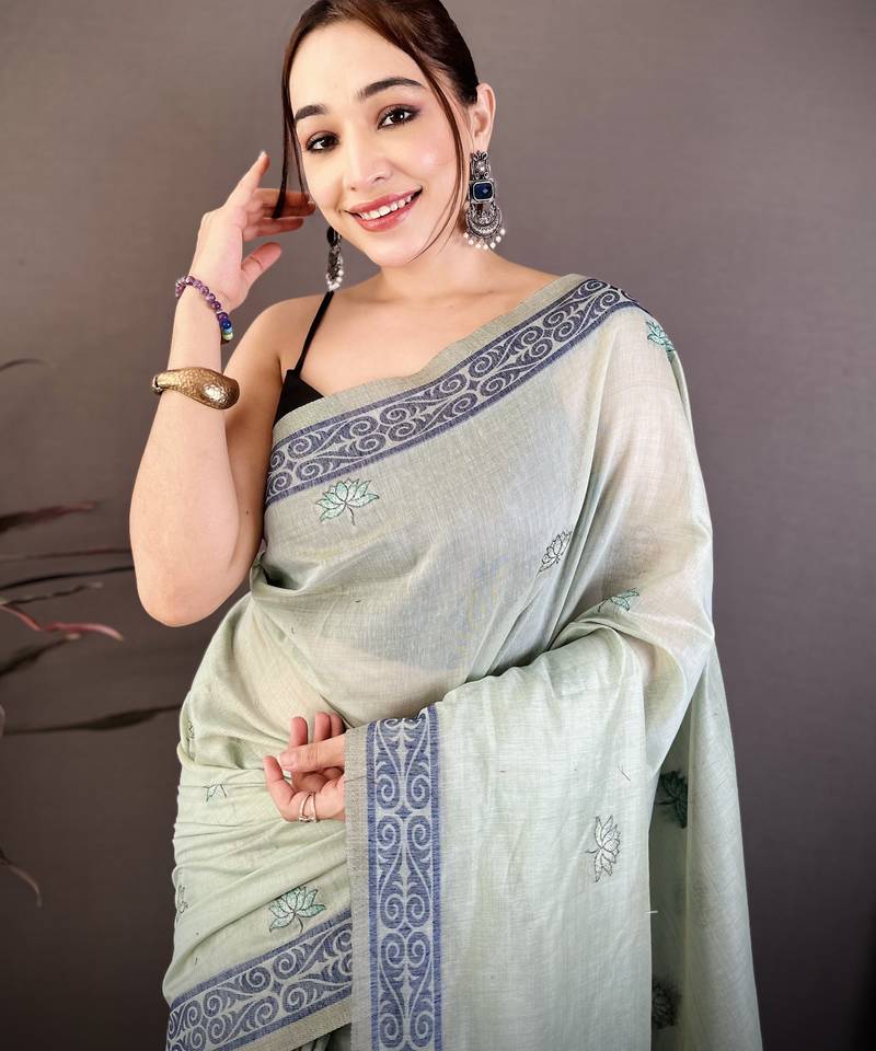 light green printed cotton saree with unstitched blouse piece