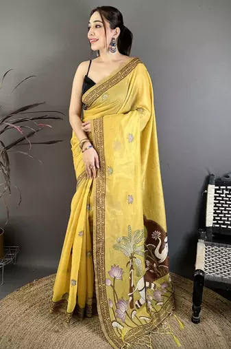 yellow printed cotton saree with unstitched blouse piece