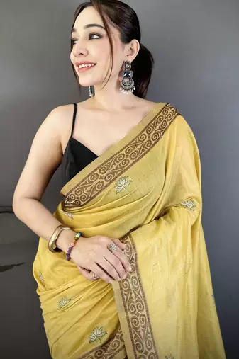 yellow printed cotton saree with unstitched blouse piece