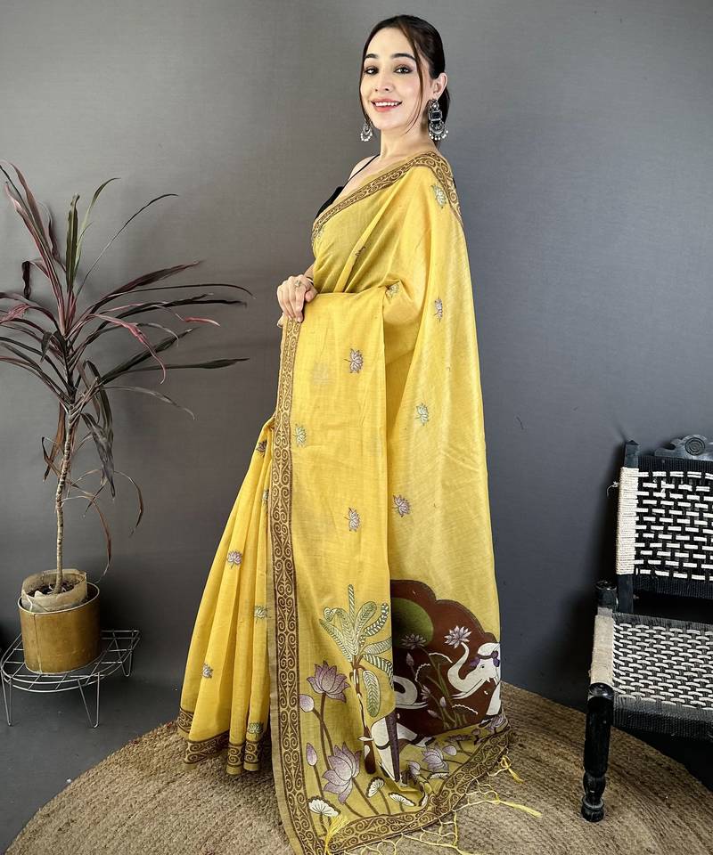 yellow printed cotton saree with unstitched blouse piece