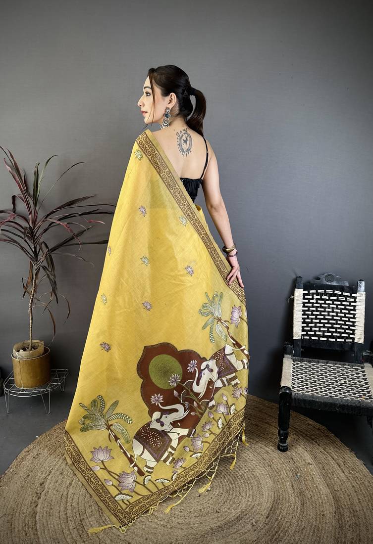 yellow printed cotton saree with unstitched blouse piece