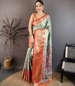 mint green floral zari woven art silk saree with unstitched blouse piece