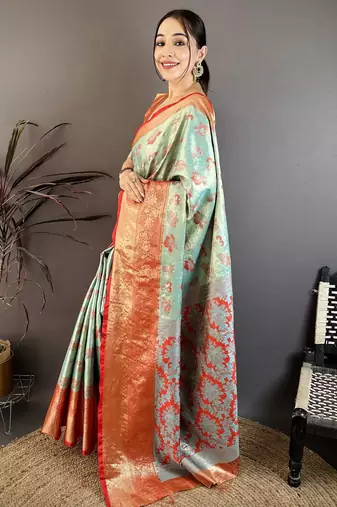 mint green floral zari woven art silk saree with unstitched blouse piece