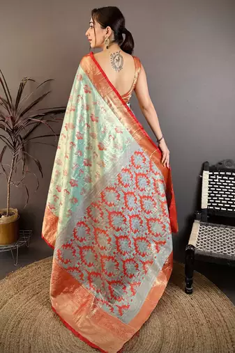 mint green floral zari woven art silk saree with unstitched blouse piece