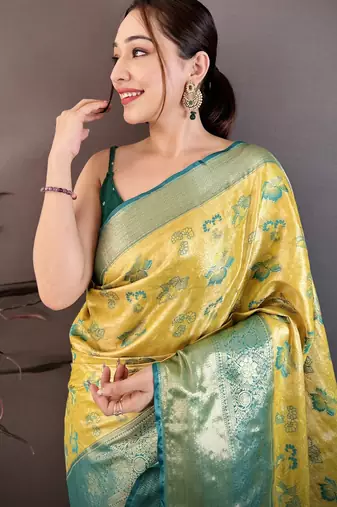 yellow floral zari woven art silk saree with unstitched blouse piece