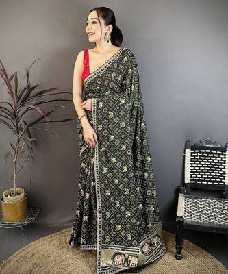 Women dark green vichitra silk blend bandhani & animal motifs bandhani saree 1