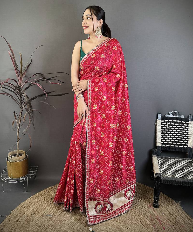 Women hot pink vichitra silk bandhani & animal motifs bandhani saree