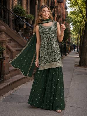Green blooming georgette suit with heavy embroidery & sequin work 1