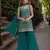 Teal green blooming georgette suit with heavy embroidery & sequin work