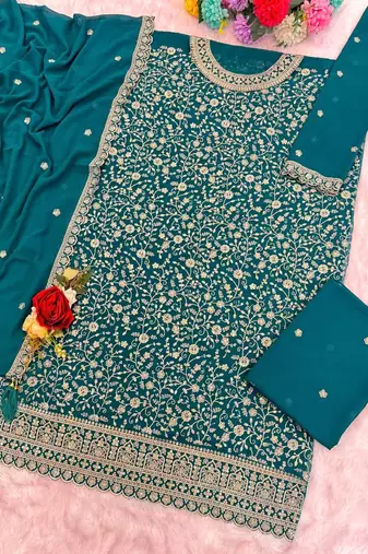 Teal green blooming georgette suit with heavy embroidery & sequin work