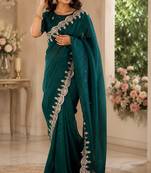 teal green embroidered party wear shimmer chiffon saree with silver scalloped border for women