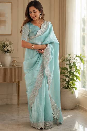 sky blue embroidered designer shimmer chiffon saree with scalloped border