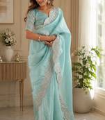 sky blue embroidered designer shimmer chiffon saree with scalloped border