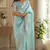 sky blue embroidered designer shimmer chiffon saree with scalloped border