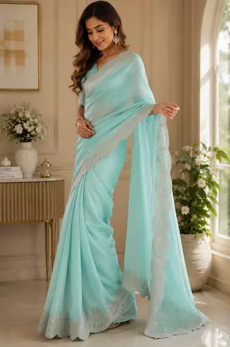 sky blue embroidered designer shimmer chiffon saree with scalloped border