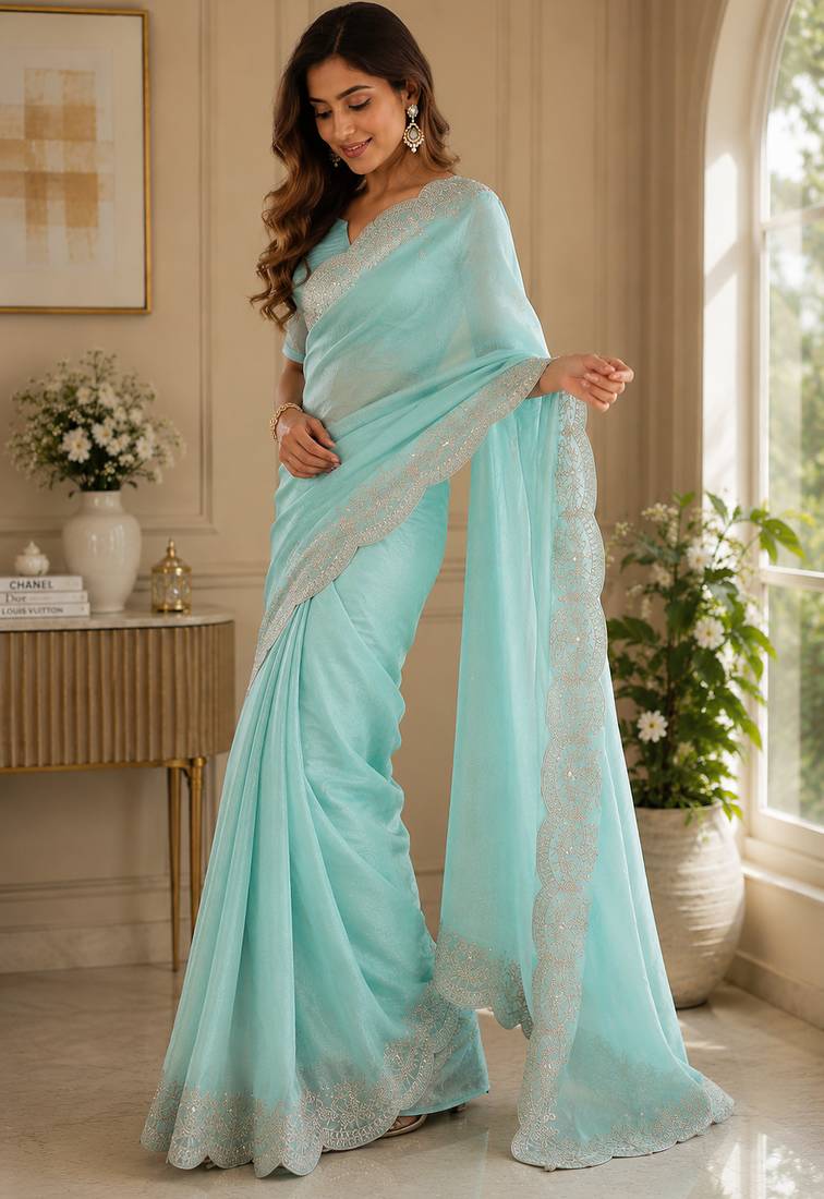sky blue embroidered designer shimmer chiffon saree with scalloped border
