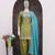 Green embroderied silk blend stitched dhoti suit