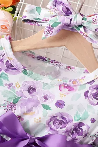 Purple floral net party wear baby dress