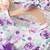 Purple floral net party wear baby dress