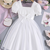 White floral embroidered net party dress for girls