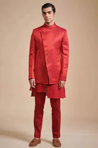 Coral red solid art art silk kurta churidar nehru jacket set for men