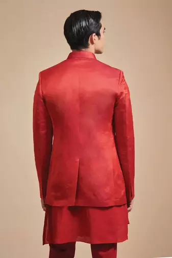 Coral red solid art art silk kurta churidar nehru jacket set for men