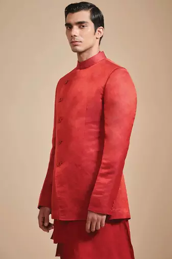 Coral red solid art art silk kurta churidar nehru jacket set for men