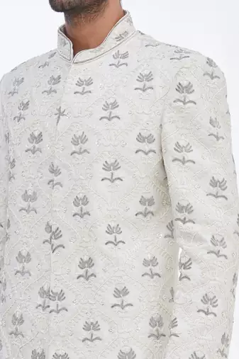 Cream hand embroidered art silk sherwani for men