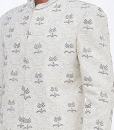 Cream hand embroidered art silk sherwani for men