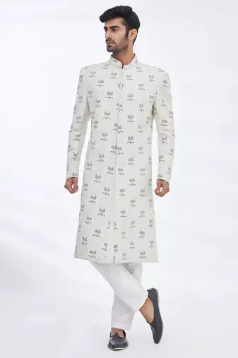 Cream hand embroidered art silk sherwani for men