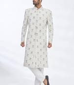 Cream hand embroidered art silk sherwani for men