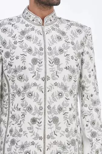 Cream hand embroidered art silk sherwani for men