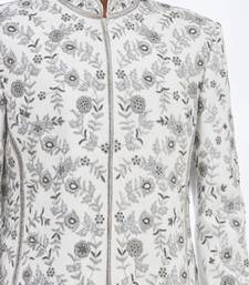 Cream hand embroidered art silk sherwani for men