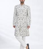 Cream hand embroidered art silk sherwani for men