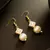 Pink pearl square drop earrings
