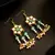 Green kundan pearl chandelier earrings