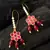 Pink floral bead drop earrings